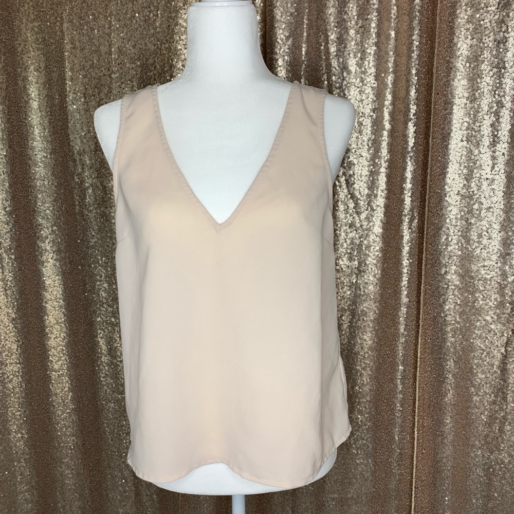 Pink sleeveless blouse